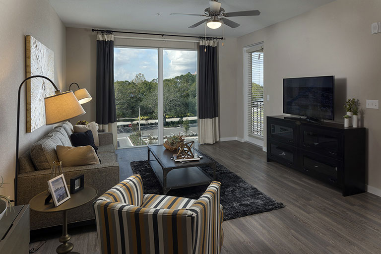 Interior living space of Dwell Maitland apartment with expansive windows